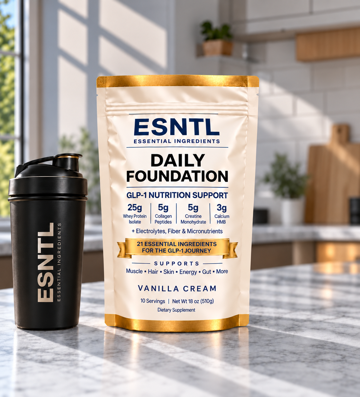 ESNTL Daily Foundation Vanilla Cream pouch beside an ESNTL shaker bottle on a marble kitchen counter.